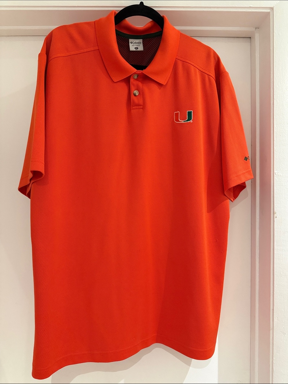 Columbia Men’s Orange Polo with Green & White University of Miami Logo
